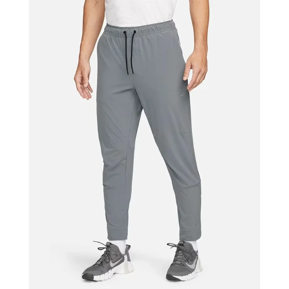 Nike Unlimited Versatile Pants Men Large Grey Dri-FIT Zippered Cuffs Performance